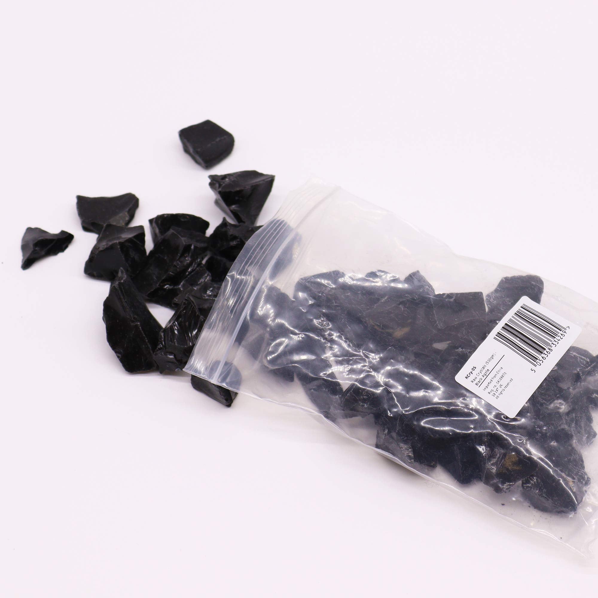 Obsidiana Negra en bruto: cristales naturales sin pulir, negro intenso y superficie vítrea; 500 g - protección interior