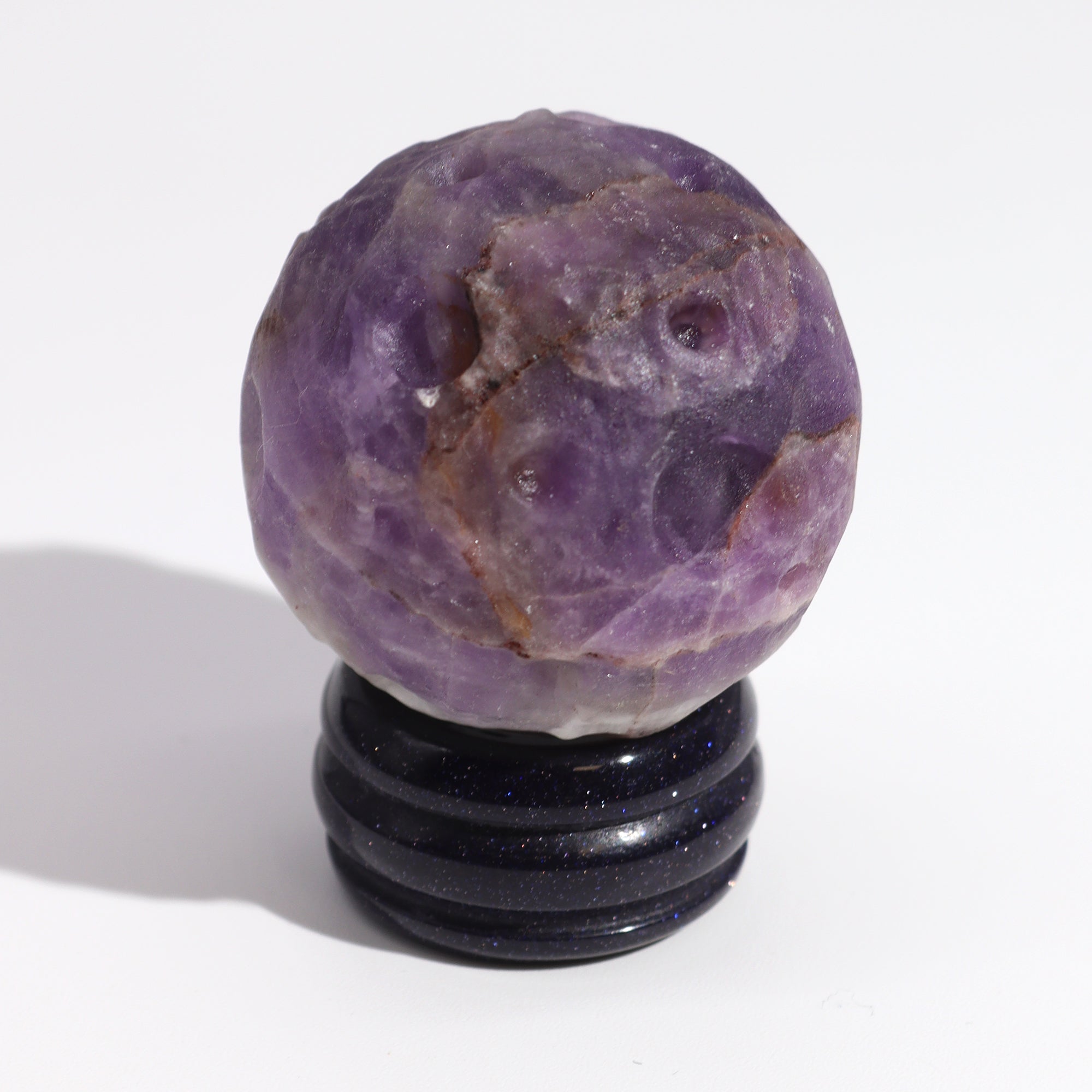 Planeta amatista: esfera morada 40 mm en soporte solar, representa Júpiter que impulsa intuición y claridad - protección