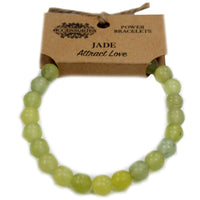 Jade verde pulsera elástica de cuentas redondas, tono esmeralda suave y acabado pulido para muñeca - armonía y prosperidad