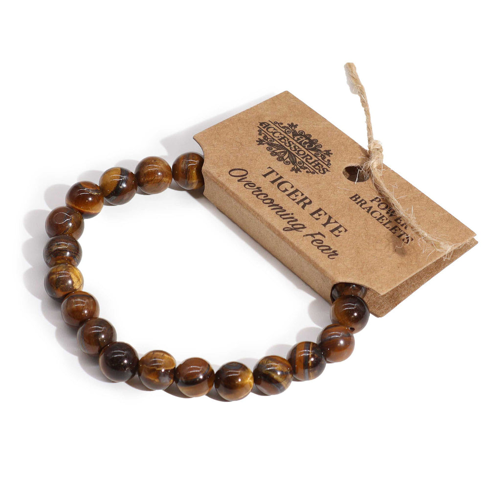 Pulsera de Ojo de Tigre: cuentas naturales, diseño elástico; tonos cálidos de marrón, dorado y ámbar - confianza y claridad