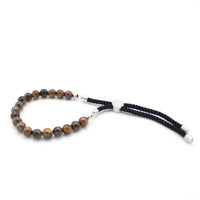 Pulsera de Hilo Negro con Ojo de Tigre: hilo negro y cuentas de Ojo de Tigre natural, cierre ajustable; dorados - Protección