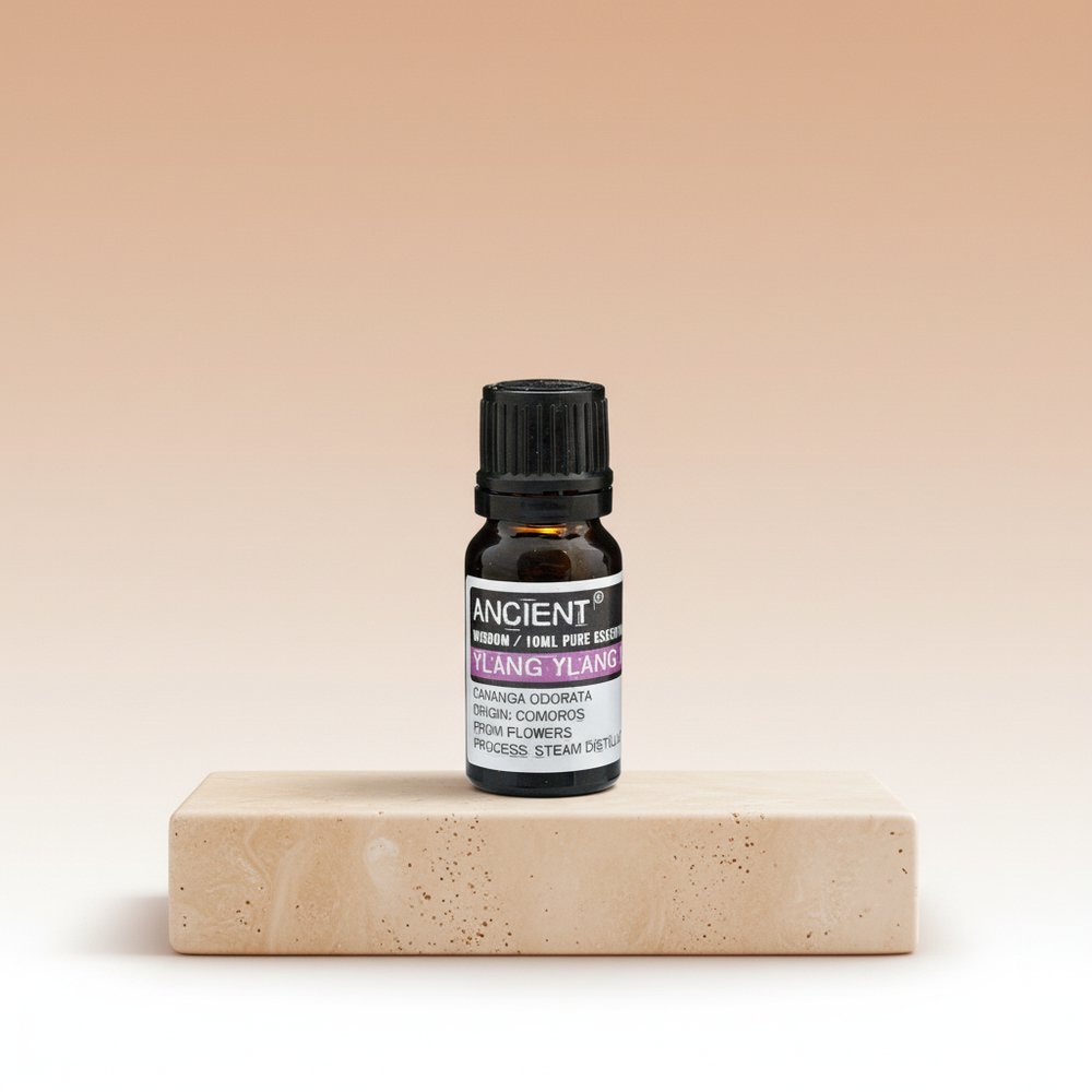 Ylang Ylang aceite esencial, frasco de vidrio transparente 10 ml, aroma floral suave - favorece relajación y bienestar.