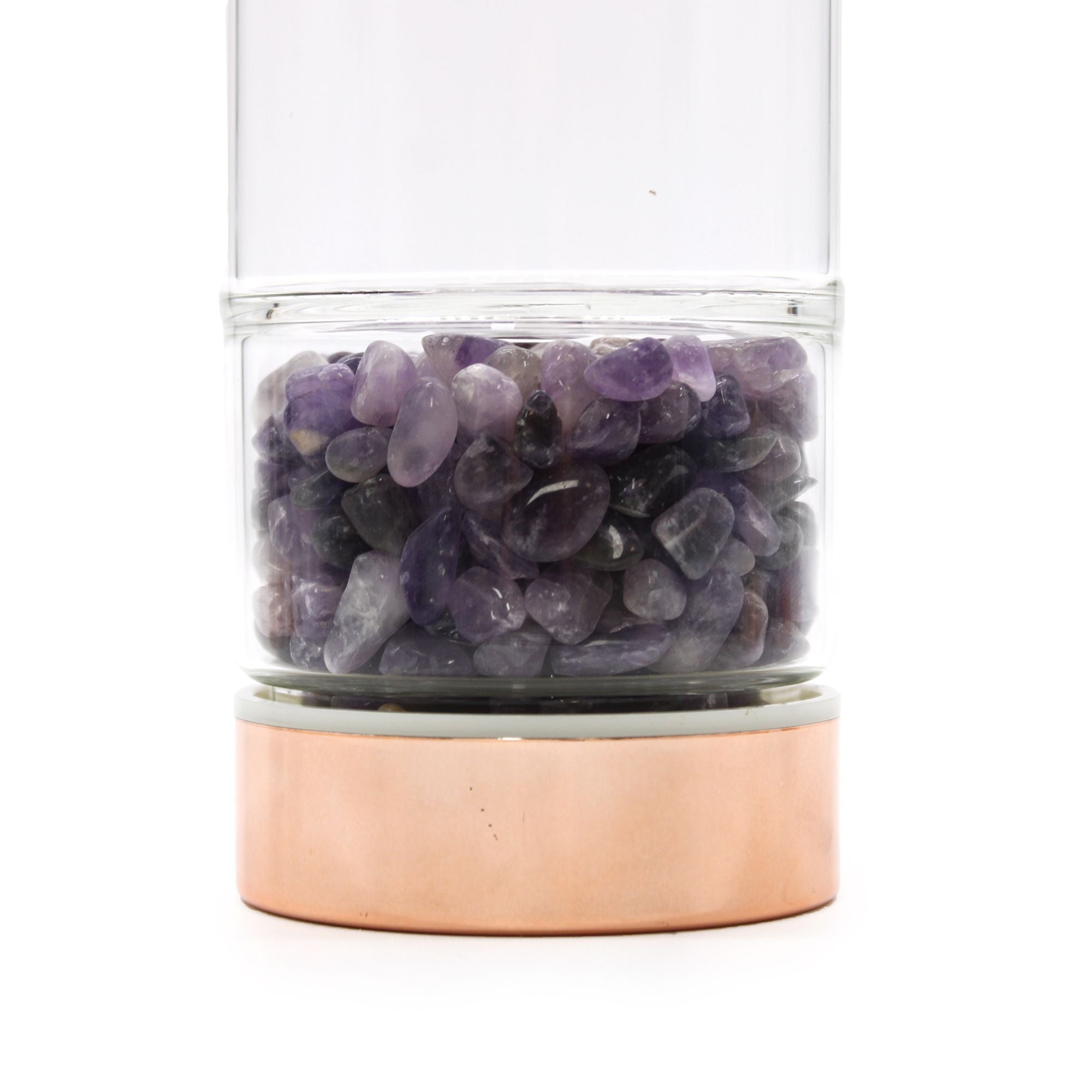Botella de cristal para té: acabado oro rosa y amatista; cuerpo translúcido y tapa dorada; favorece calma al infusionar.