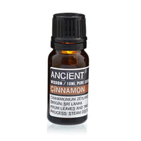 Aceite esencial de canela en botella de vidrio ámbar 10 ml con etiqueta, aroma cálido – favorece relajación y aromaterapia
