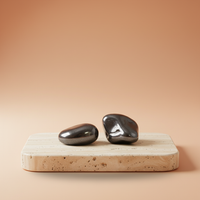 Hematita XL, piedra rodada de color gris oscuro con brillo metálico - favorece enraizamiento, protección y concentración