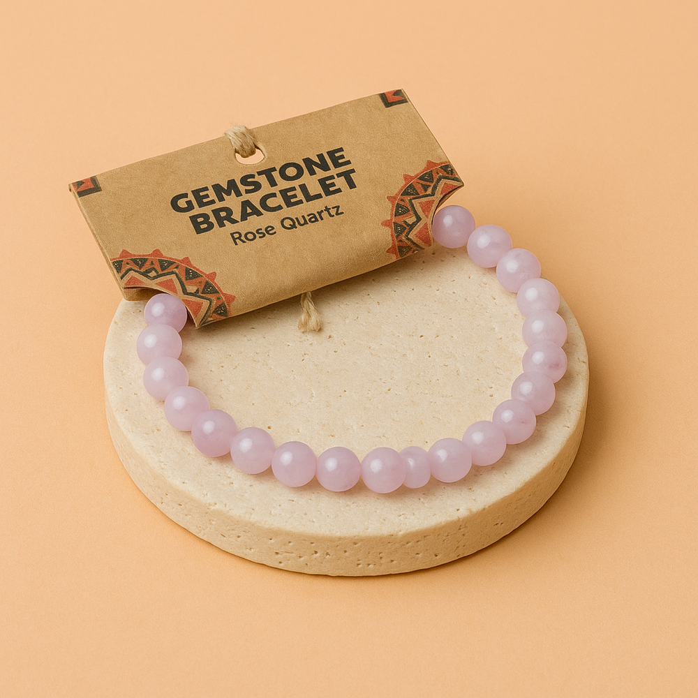 Pulsera de Cuarzo Rosa, elástica con cuentas naturales en tono rosado y piel en contacto directo - Atrae amor y armonía