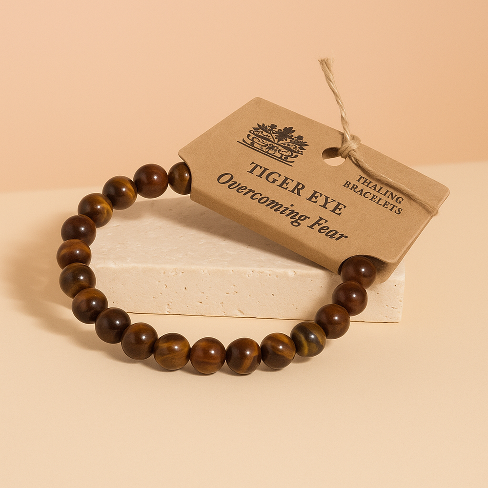 Pulsera de ojo de tigre: cuentas naturales pulidas, elástica, en tonos marrón-dorado-ámbar con brillo - equilibrio y claridad