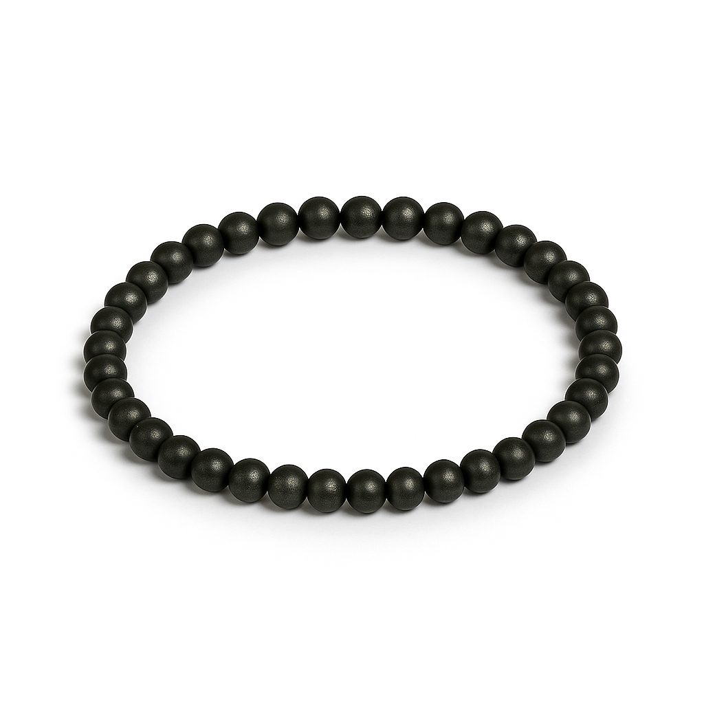 Pulsera de pirita de canto rodado sobre fondo blanco, con cuentas redondas, fotografía de producto Yo Soy Munduko.