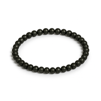 Pulsera de pirita de canto rodado sobre fondo blanco, con cuentas redondas, fotografía de producto Yo Soy Munduko.