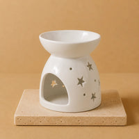Quemador de Aceite Blanco con diseño de estrellas, cerámica y cuenco amplio para difundir aromas, emite luz cálida - bienestar