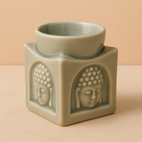 Quemador Buda Cuadrado de cerámica en Turquesa Claro, pieza con figura tallada para aromaterapia - equilibrio