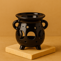 Quemador de aceite Caldero Lunar negro, cerámica de calidad con grabados lunares; compacto para aromas - equilibrio